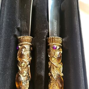 Ornate Gold and Purple Handle Knives